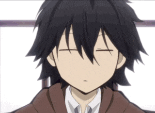 a close up of a boy with his eyes closed
