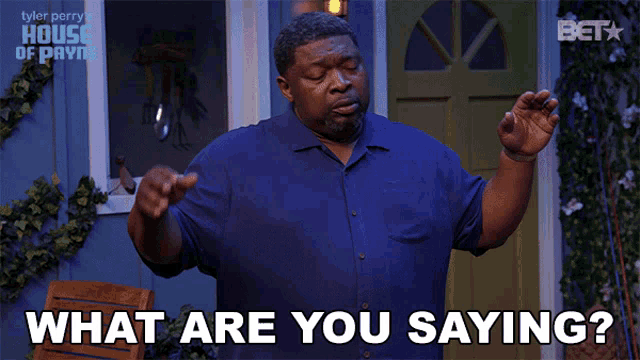 a man says what are you saying in front of a blue house