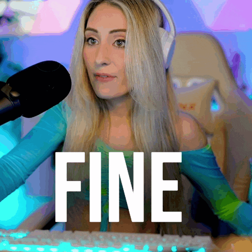a woman wearing headphones is sitting in front of a microphone and the word fine is visible