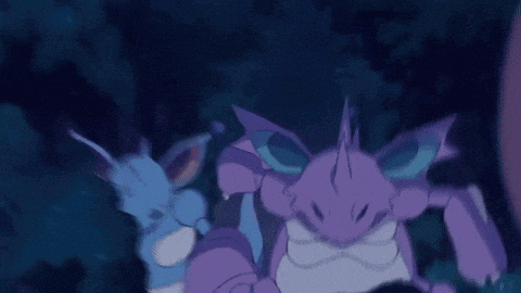 a couple of purple pokemon standing next to each other in the dark .