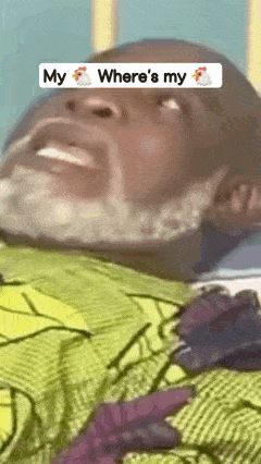 a man with a beard is laying down with his mouth open and the words " my where 's my " on his face