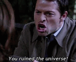 a man is making a funny face while talking to a woman and says `` you ruined the universe ! ''