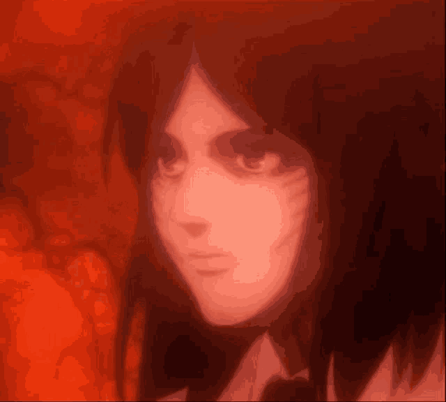 a close up of a person 's face in a red background