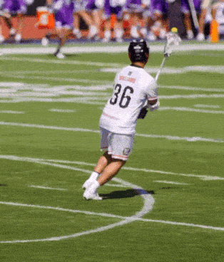 a lacrosse player with the number 36 on his back
