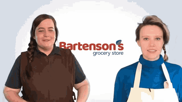 two women standing in front of a bartson 's grocery store logo