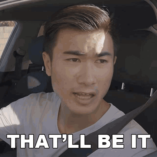 a man in a car with the words that 'll be it