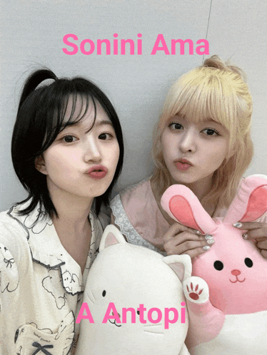 two girls posing for a picture with the words sonini ama a antopia on the bottom