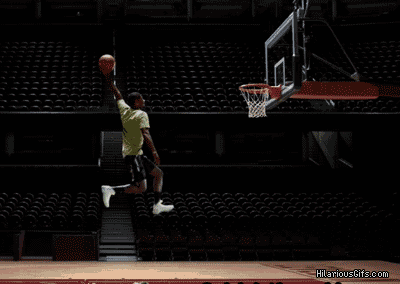 a man is jumping in the air to dunk a basketball with hilariousgifs.com written on the bottom