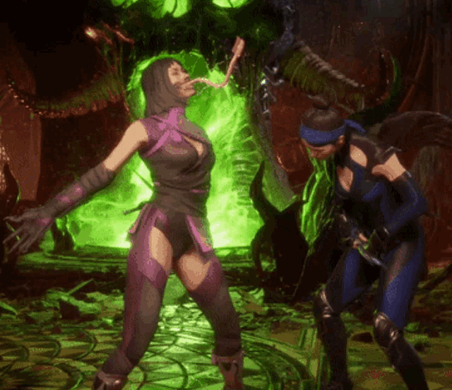 two women are fighting in a video game and one of them is wearing a purple outfit