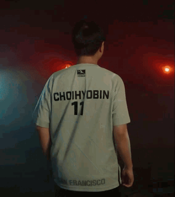 a man wearing a shock jersey with the number 11