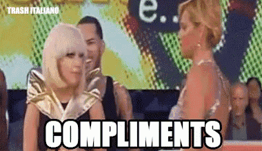 two women are sitting next to each other and the word compliments is on the bottom