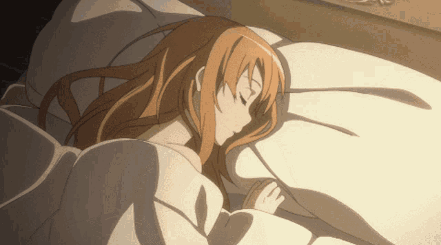 a girl with long brown hair is sleeping in a bed with white sheets