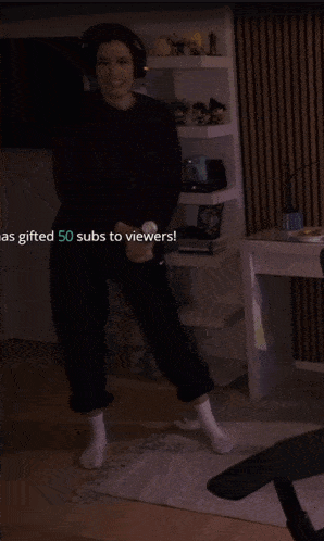 a person standing in front of a sign that says gifted 50 subs to viewers