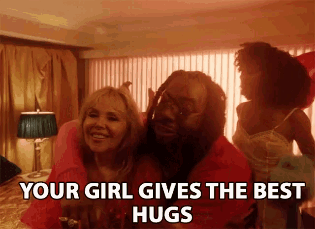a woman is hugging a man with the words your girl gives the best hugs above them