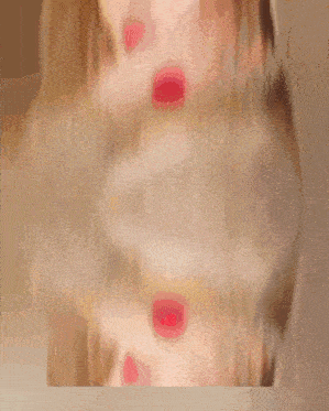 a blurry picture of a woman with the letter e visible