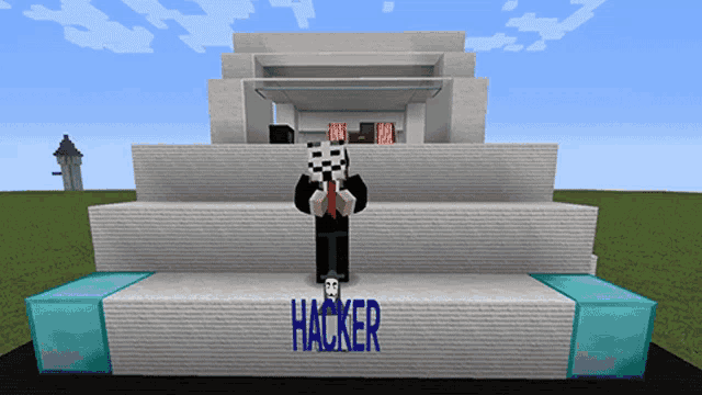 a man in a mask stands in front of a building that says hacker on it
