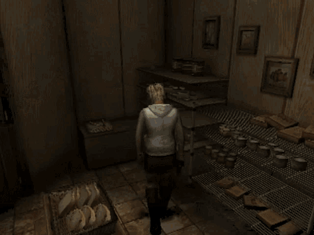 a woman in a video game is kneeling down