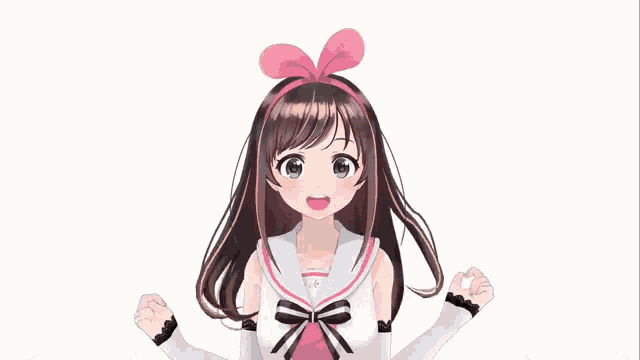 a girl with a pink bow on her head is waving her hand