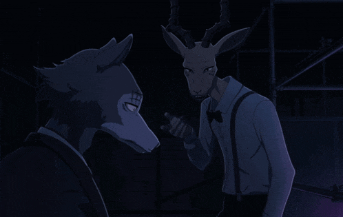 a wolf and a deer are standing in the dark