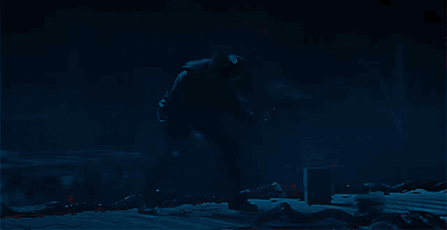 a lightning bolt strikes a building in a dark room