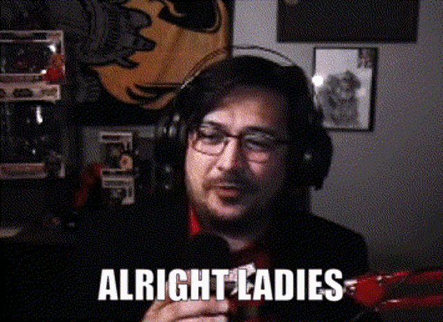 a man wearing headphones says " alright ladies "