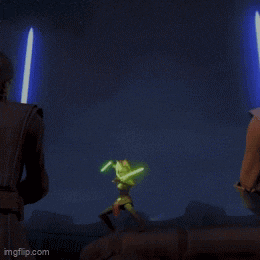 a blurry picture of a man holding a green lightsaber and another man holding a blue lightsaber