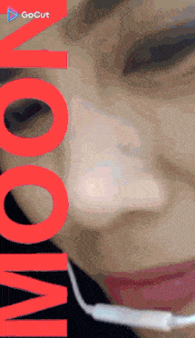 a close up of a woman 's face with the words " gocut " above her