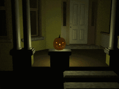 a pumpkin with a face carved into it is on a pedestal