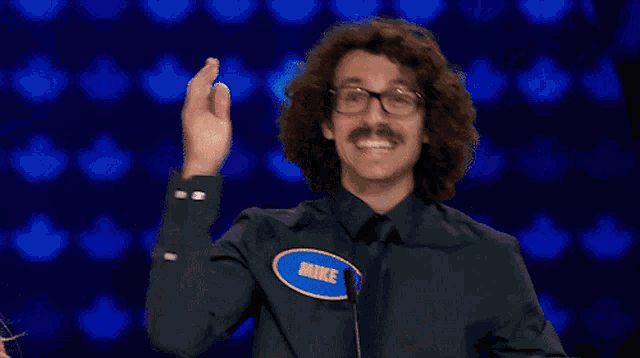 a man with a name tag that says mike