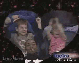 a picture of a man and a little girl in a heart shaped frame with the words metro kiss cam on the bottom