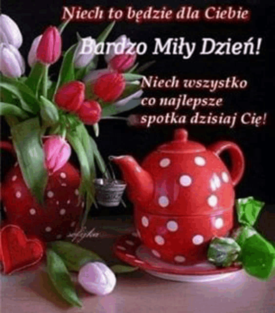 a red teapot with white polka dots is sitting on a saucer next to a vase of flowers on a table .