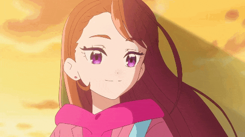 a girl with purple eyes is wearing a pink jacket