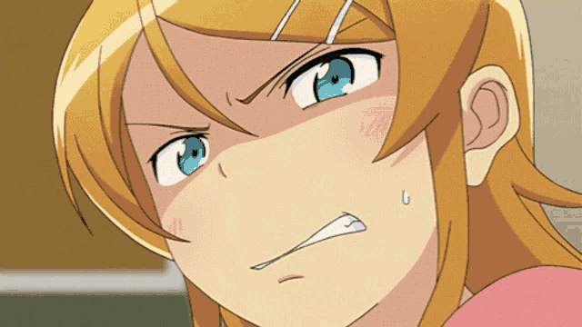 a close up of a girl 's face with a surprised expression