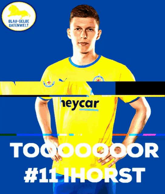 a man in a yellow shirt with heycar written on it