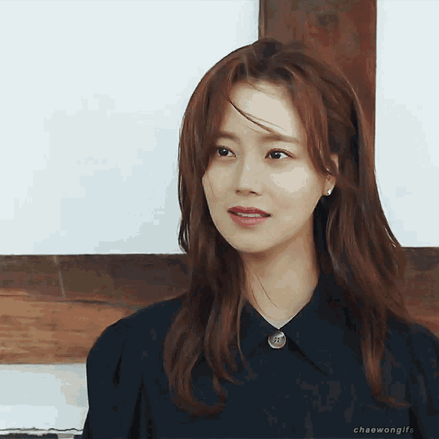 a close up of a woman 's face with the words chaewongifs on the bottom