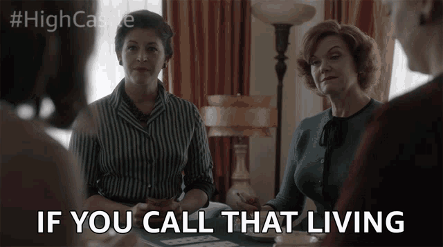 a group of women sitting around a table with the words if you call that living above them