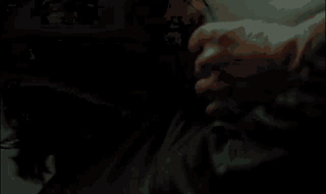a close up of a person 's face with blood coming out of it .
