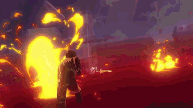 a man stands in front of a large fireball