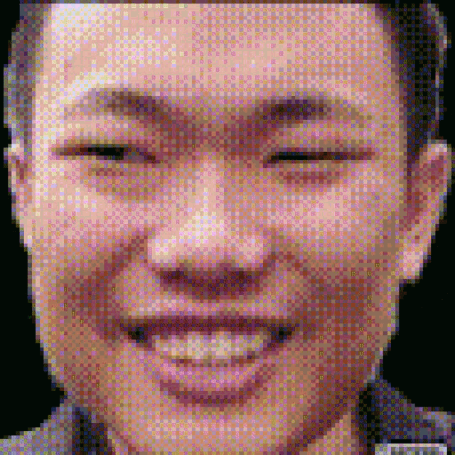 a close up of a man 's face with a pixelated background