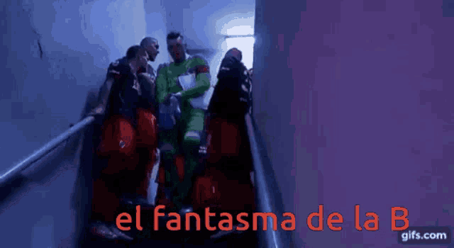 a group of people are walking down stairs and the words el fantasma de la b are on the bottom