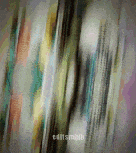 a blurred image with editsmhjb written on the bottom