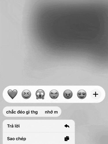 a screenshot of a text message with a heart smiley face angry face and sad face