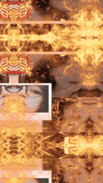a picture of a woman 's face is surrounded by fire