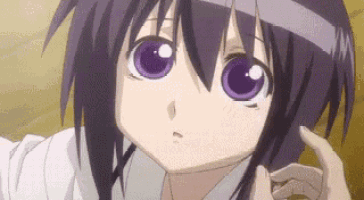 a close up of a purple haired anime girl with purple eyes .