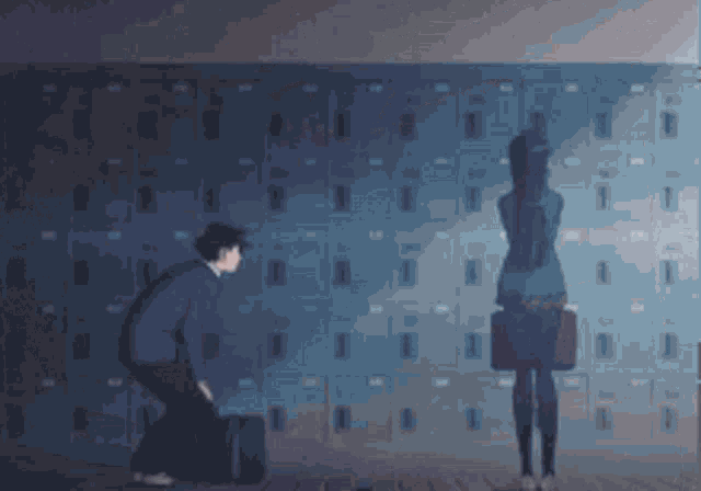 a man and a girl are standing in front of lockers