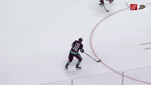 a hockey game is being played and the goalie is wearing the number 31