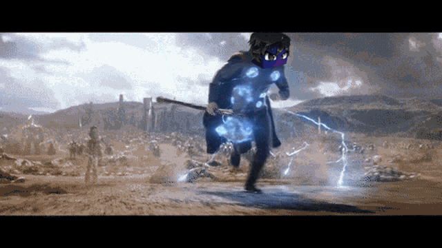 a man in a superhero costume is running through a desert