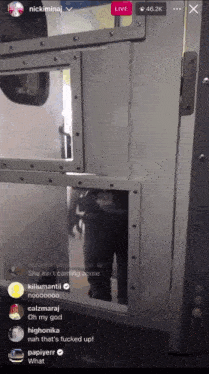 a screenshot of nickiminaj 's live shows a person behind a door