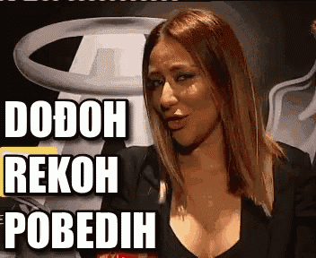 a woman in a black top with the words dodoh rekoh pobedih behind her