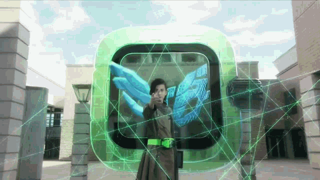 a person is standing in front of a green screen that says ' ao ' on it